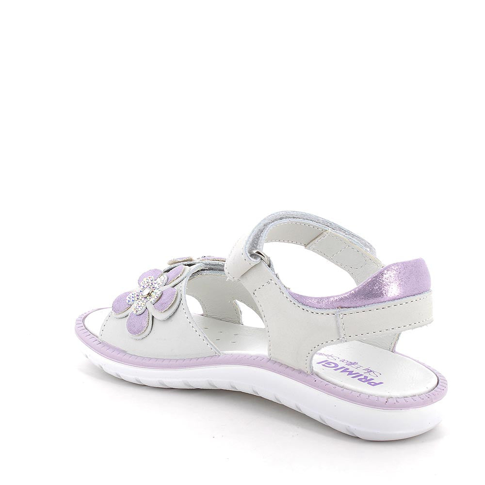 A girls open toe sandal by Prmigi, style Alanis in white and lilac, velcro fastening. Right inner side view.