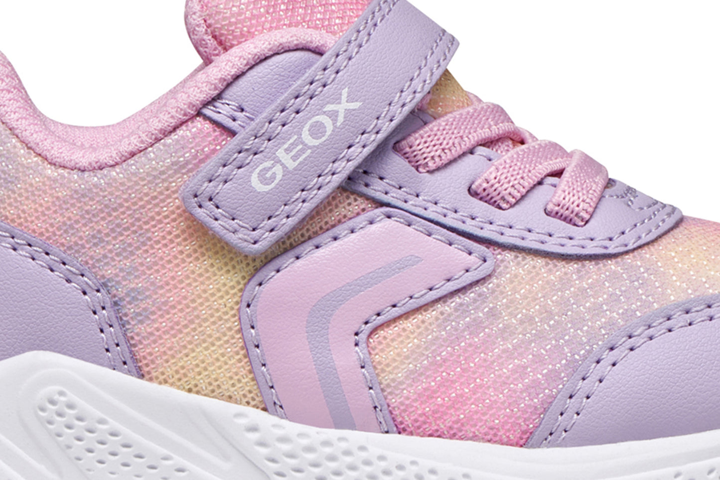 A girls trainer by Geox, style Sprintye in lilac/pik with ombre mesh detailing, velcro strap and elastic laces. Zoomed image of side