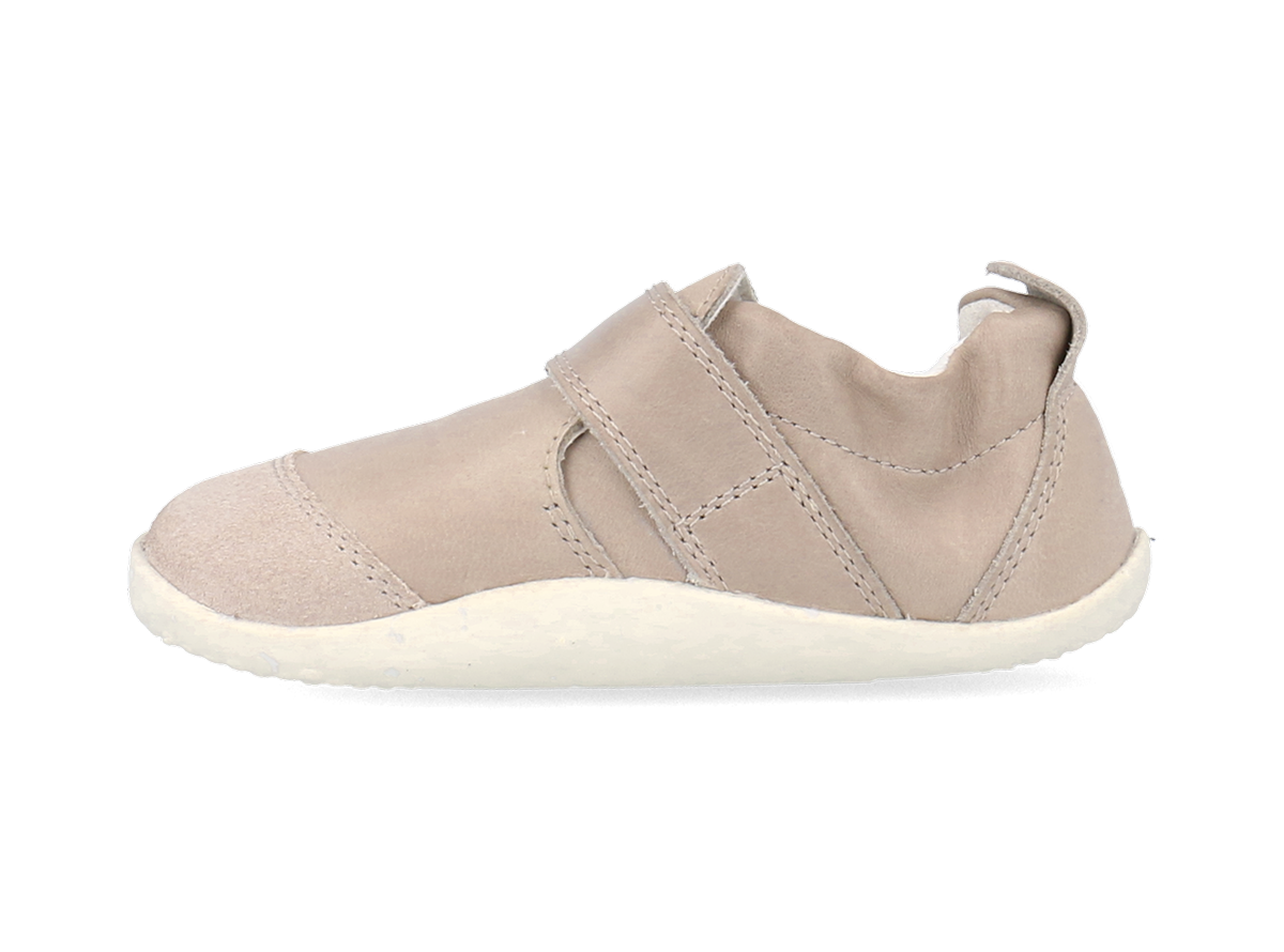 A unisex pre-walker by Bobux, style XP Marvel,in taupe leather and suede with velcro strap. Left side view.
