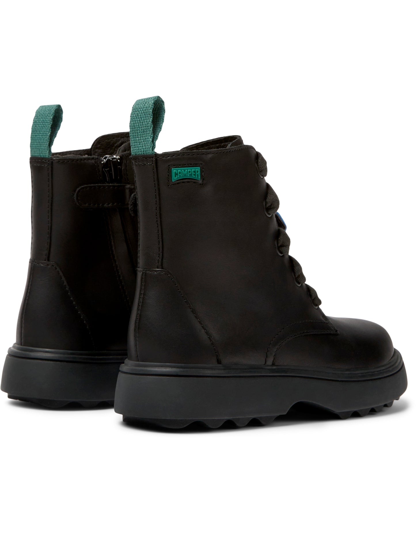 A girls chunky ankle boot by Camper, style K900150-012,in black leather with zip and lace fastening. Angled view..