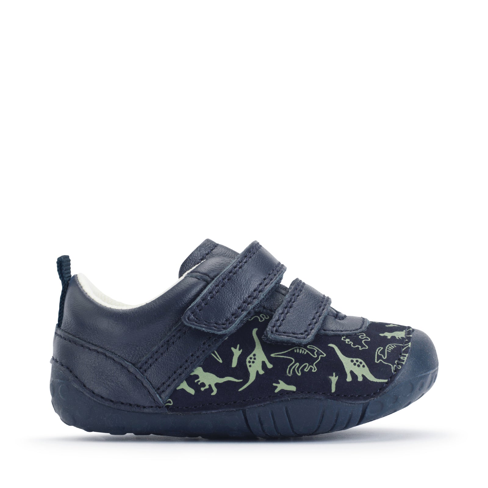 A boys pre-walker shoe by Start-Rite in style Roar in navy blue with dinosaur pattern, two velcro straps and toe and heel bumpers.