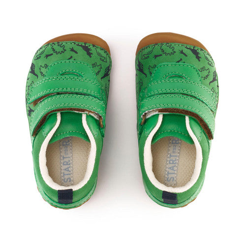 A pair of boys pre walkers by Start-Rite, style Roar, in green nubuck with navy dinosaur print and velcro fastening. Above view of pair.