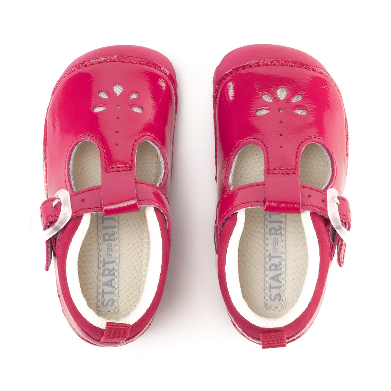 A pair of girls T-Bar pre-walkers by Start-Rite, style Baby Bubble, in red patent leather with silver punch out detail and toe bumper. Buckle fastening. Above view.