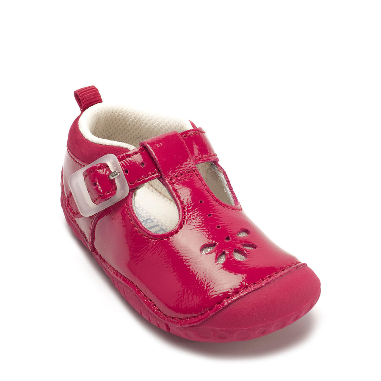 A girls T-Bar pre-walker by Start-Rite, style Baby Bubble, in red patent leather with silver punch out detail and toe bumper. Buckle fastening. Angled view.