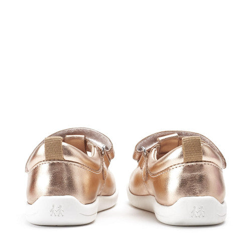 A pair of girls T-Bar shoes by Start- Rite, style Puzzle, in Rose Gold leather with Velcro fastening. Back view.