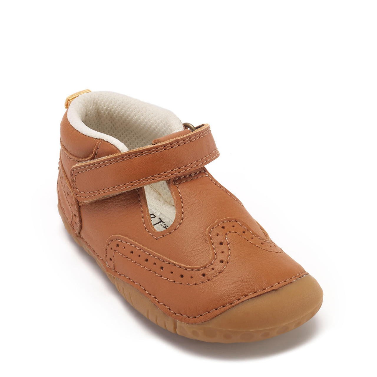 A boys T-Bar pre-walker by Start-Rite + JoJo Maman Bebe, style Share,in tan leather with brogue detail and toe bumper. Velcro fastening. Angled right side view.