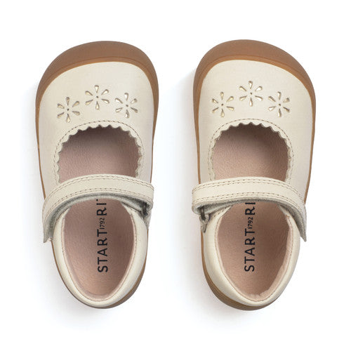 A girls shoe by Start-Rite, style Charms, in dusky pink with t-bar, velcro strap and front and back bumpers. Top view of pair