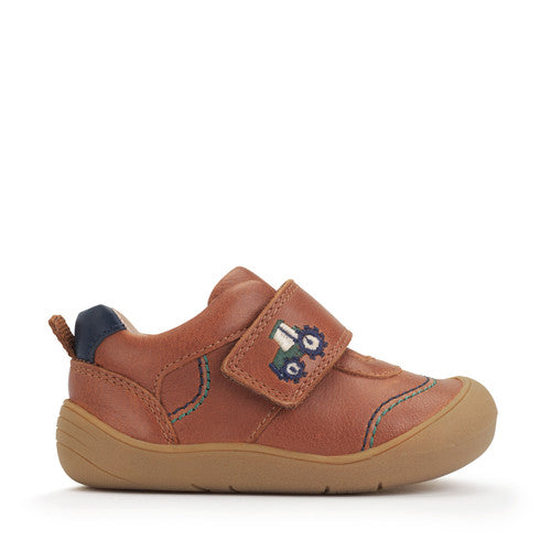 A boys casual shoe by Start-Rite, style Harvest, in tan with heel and toe bumpers and tractor detail to the velcro fastening. Right side view.