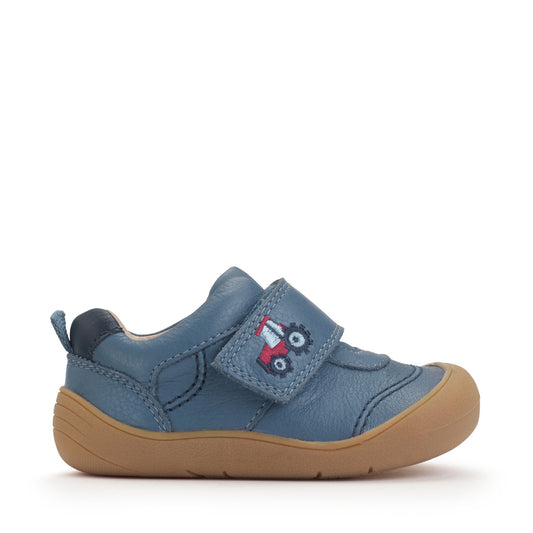 A boys casual shoe by Start-Rite, style Harvest, in blue with heel and toe bumpers and red tractor detail to the velcro fastening. Right side view.