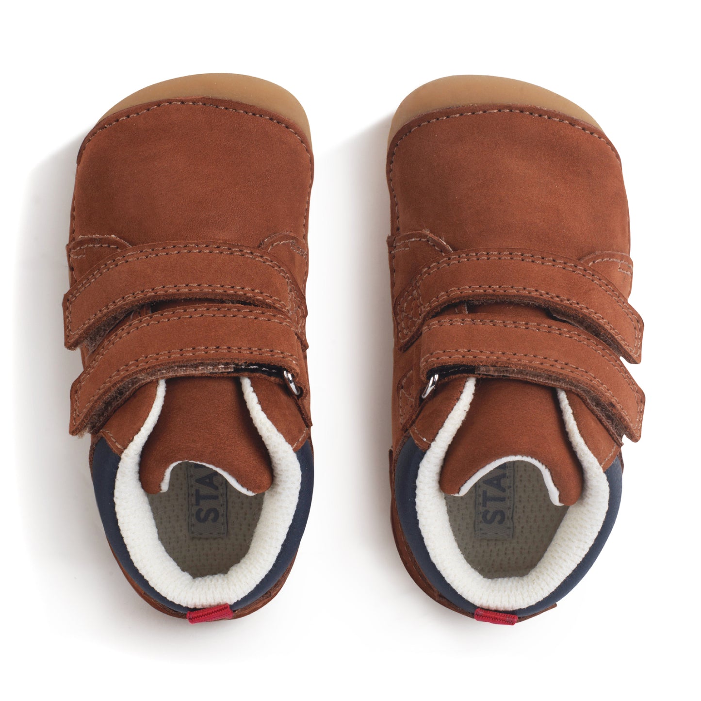 A boys shoe by Start-Rite, stye Pip, in tan with heel and toe bumpers and two velcro straps. Top view of pair