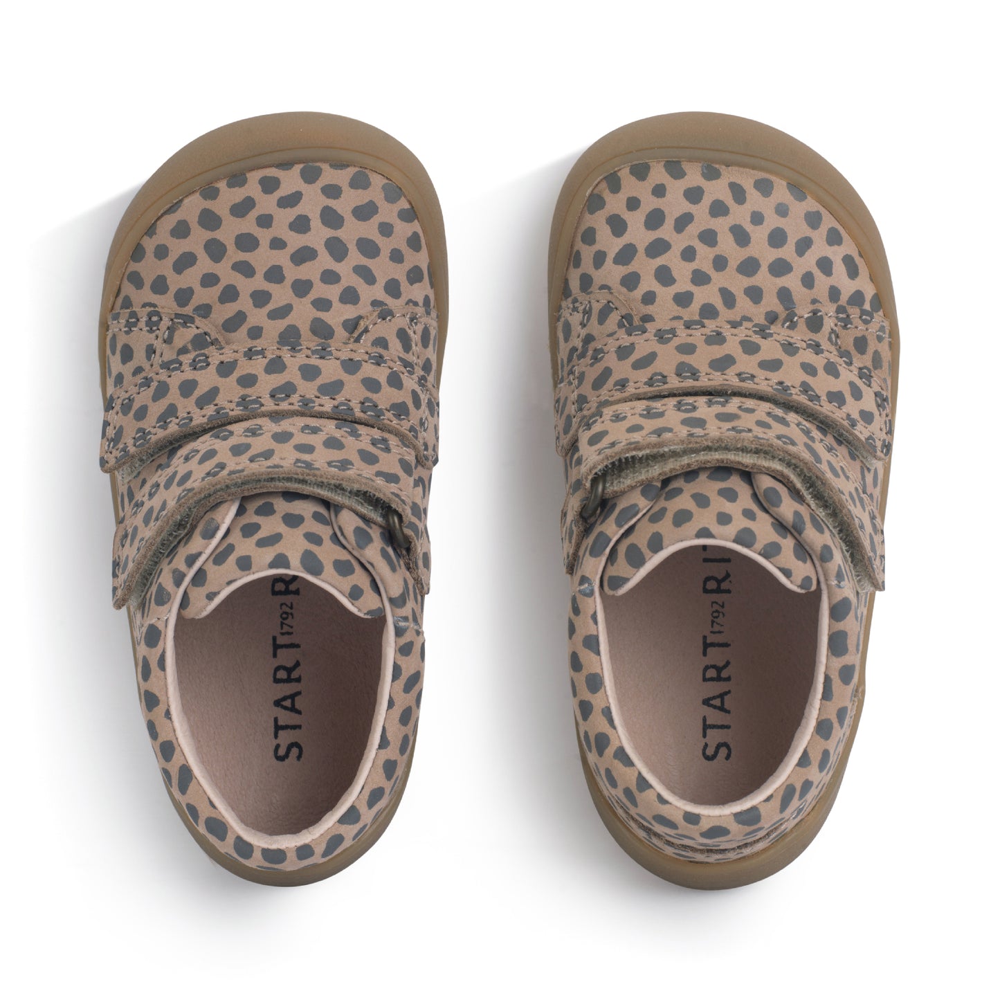 A girls shoe by Start-Rite, stye Scoot, in taupe with heel and toe bumpers and two velcro straps. Top view of pair