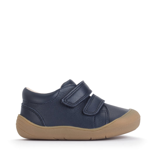 A boys shoe by Start-Rite, stye Scoot, in navy with heel and toe bumpers and two velcro straps. Right side view