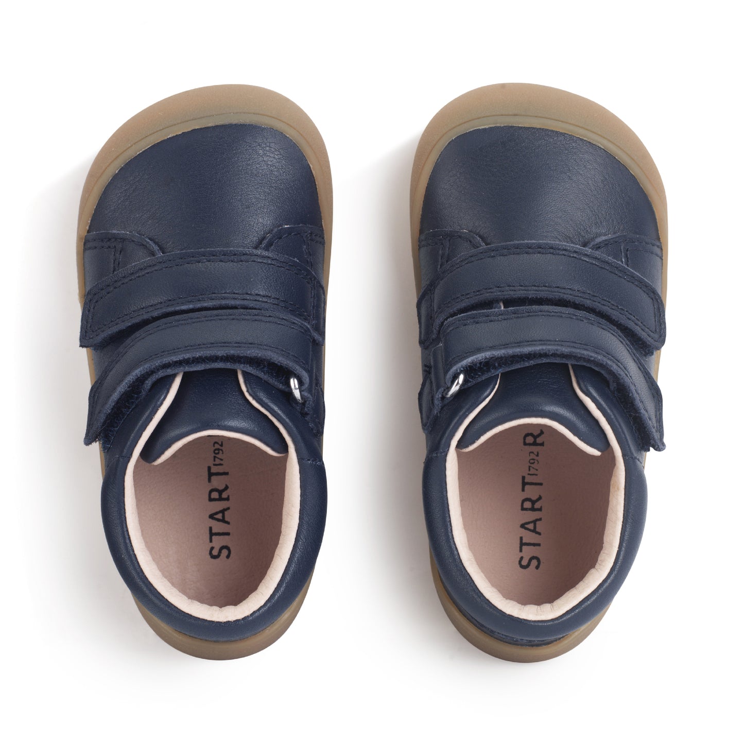 A boys shoe by Start-Rite, stye Scoot, in navy with heel and toe bumpers and two velcro straps. Top view of pair