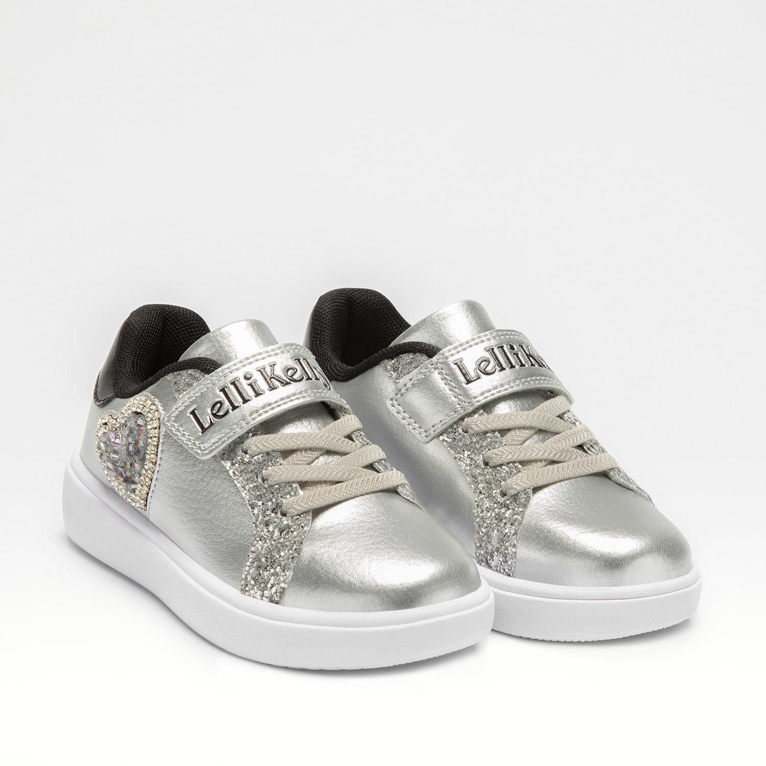 A pair of girls trainers by Lelli Kelly, style LKAA3828, with embellished heart detail in silver and black with single velcro fastening.