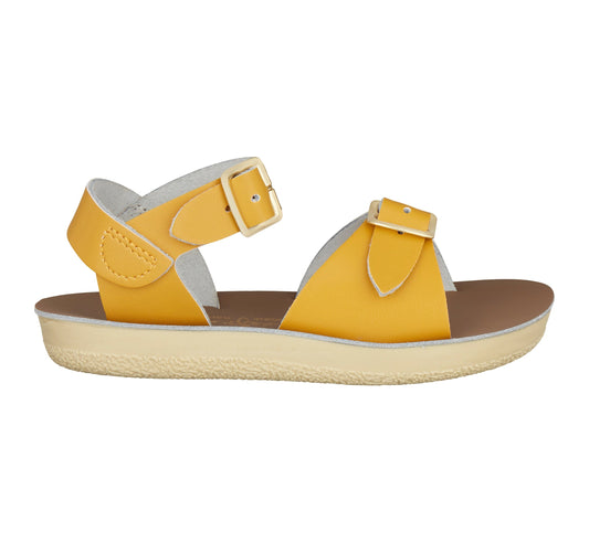 A unisex sandal by Salt Water Sandals in mustard with double buckle fastening across the instep and around the ankle. Open Toe and Sling-back. Right Side view.