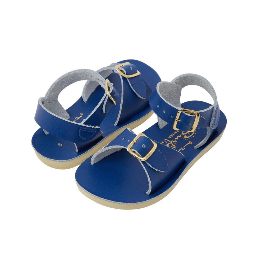 A unisex sandal by Salt Water Sandals in blue with double buckle fastening across the instep and around the ankle. Open Toe and Sling-back. Pair view.