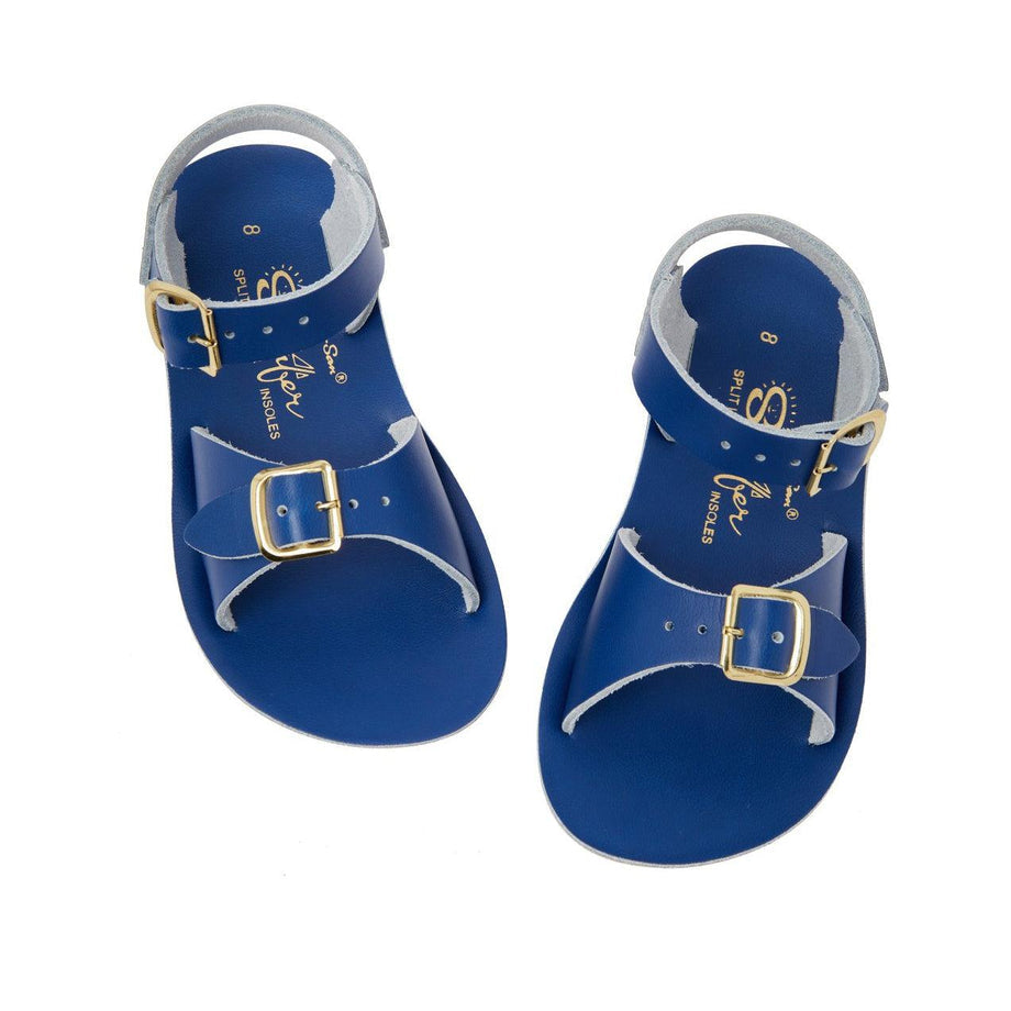 A unisex sandal by Salt Water Sandals in blue with double buckle fastening across the instep and around the ankle. Open Toe and Sling-back. Top view.