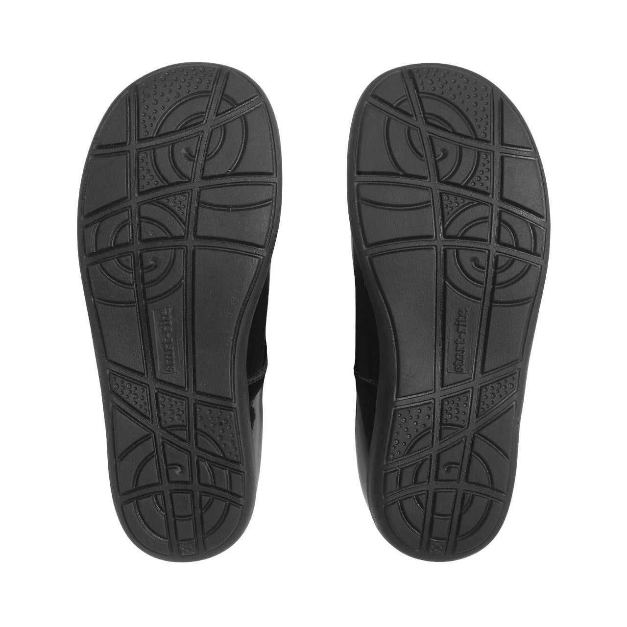 A girls T-bar school shoe by Start-Rite, style Charlotte in black leather with floral punch out detail and velcro fastening. View of soles.