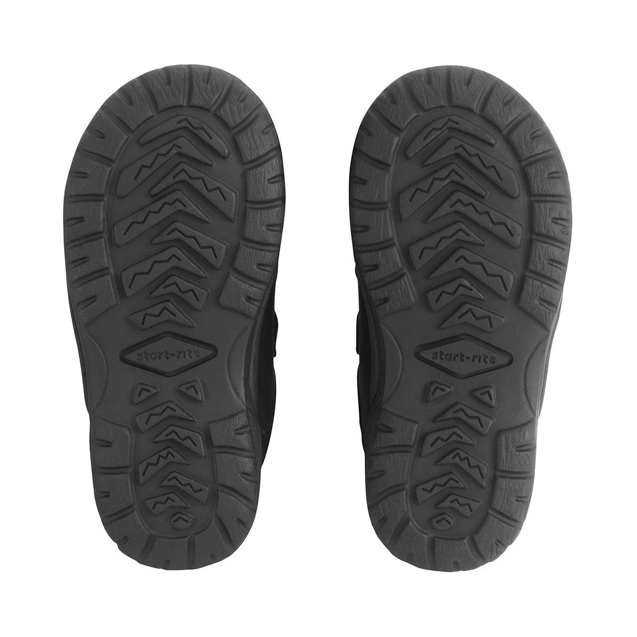 A pair of boys school shoes by Start Rite, style Action, in black leather and textile with double velcro fastening. View of soles.