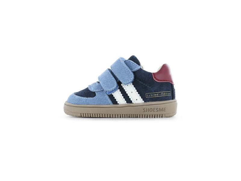 Shoesme Mid Top Trainer in navy and light blue with double Velcro strap, red and white detailing and a gum sole. Left side view