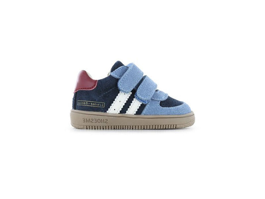 Shoesme Mid Top Trainer in navy and light blue with double Velcro strap, red and white detailing and a gum sole. Left side view