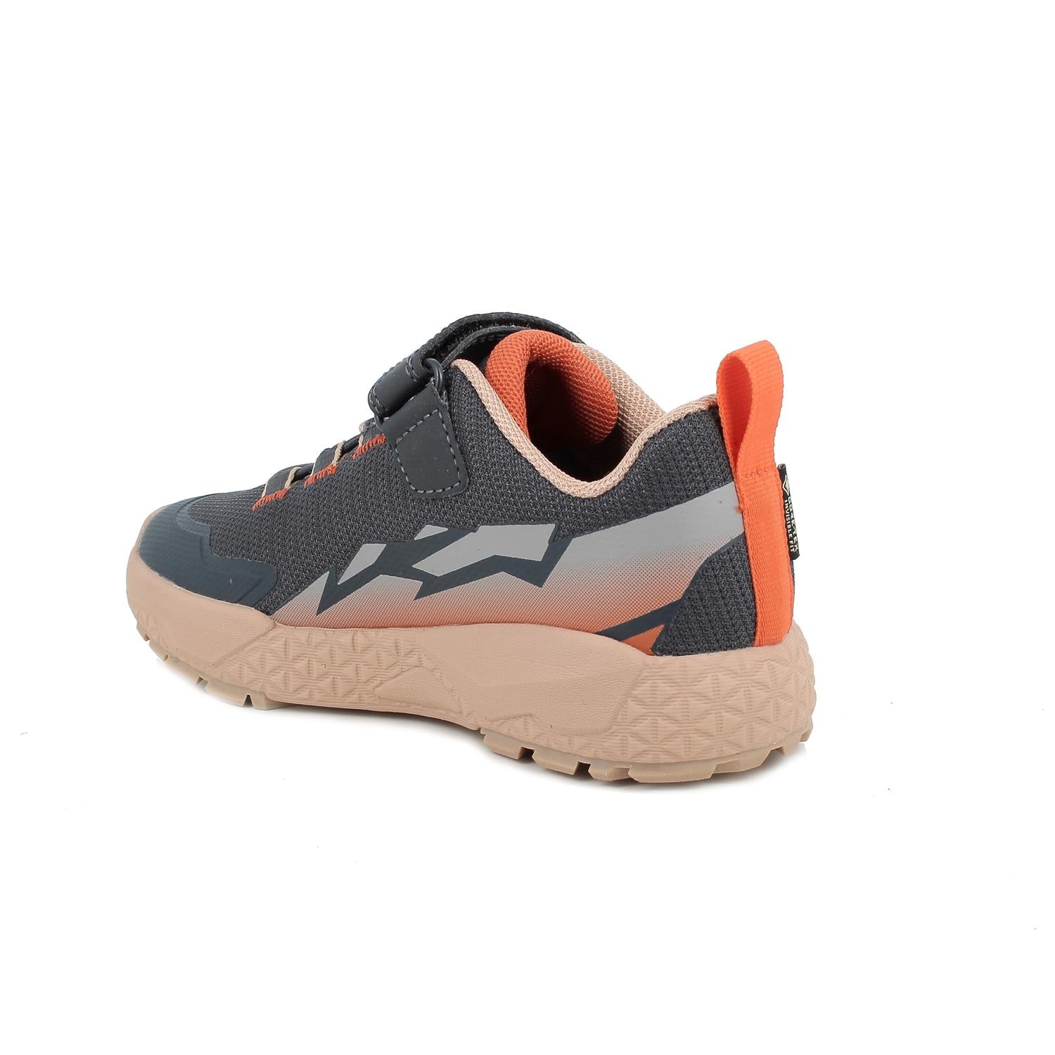 A boys trainer by Primigi, style STORM GTX 891522 in grey with taupe sole and trim. Velcro fastening.  Angled left side view.