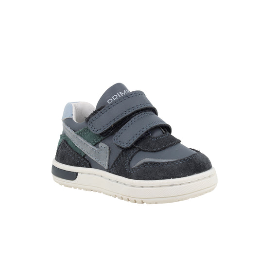 Primigi boys trainer in navy with double Velcro fastening and a white sole. Right side view
