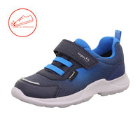 Superfit Rush navy and blue trainer with Velcro strap, white sole and a protective toe bumper. Left front view. 