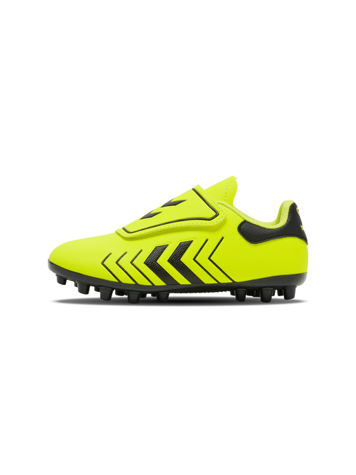 A firm ground football boot by Hummel, style Hattrick MG JR 217580-5998, in neon yellow with velcro fastening. Right side view.