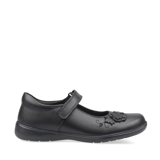 A girls Mary Jane school shoe by Start Rite, style Wish, in black leather with flower motif and velcro fastening. Right side view.