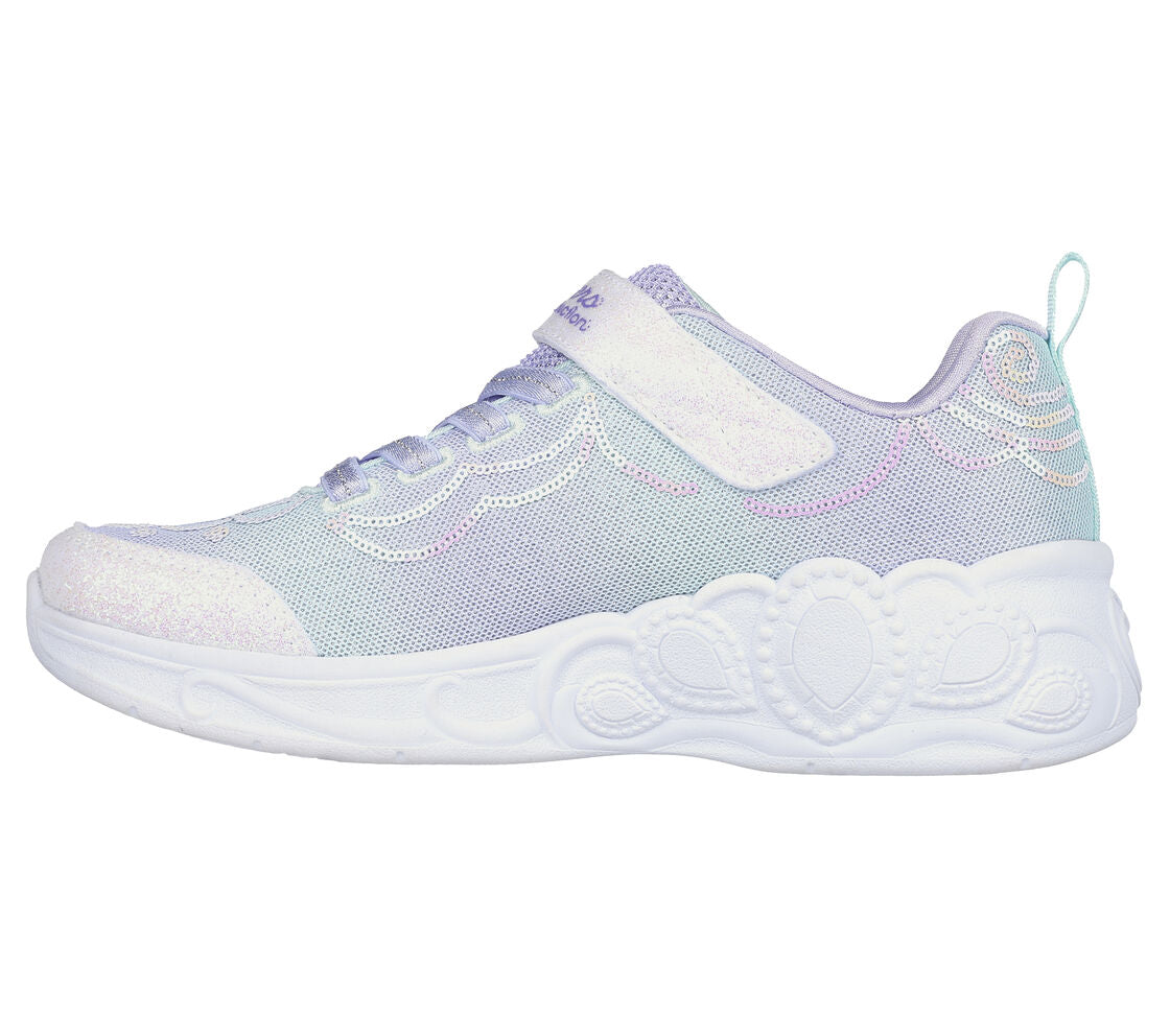 A girls light up trainer by Skechers, style Princess Wishes, in lilac sequin/multi with bungee lace and velcro fastening. Left side view.