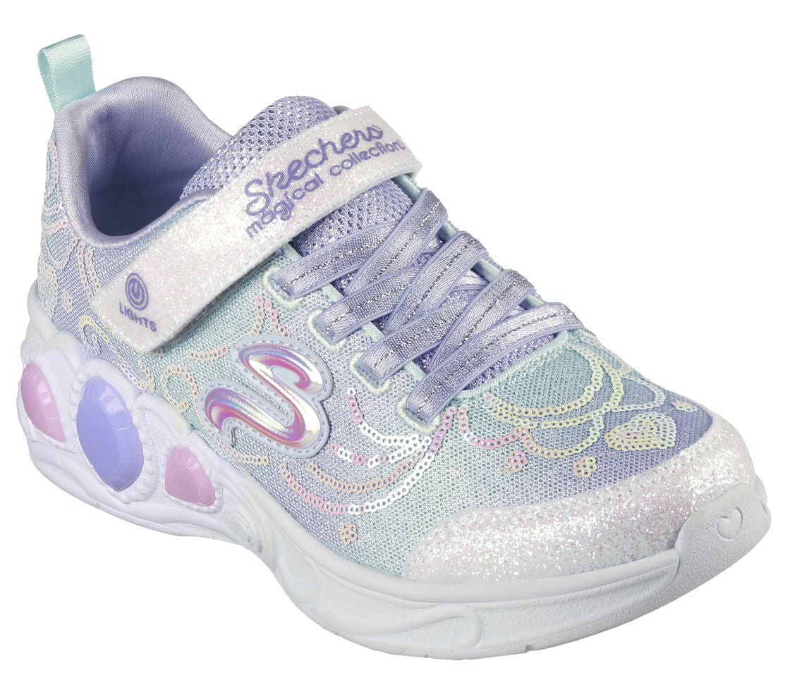 A girls light up trainer by Skechers, style Princess Wishes, in lilac sequin/multi with bungee lace and velcro fastening. Angled view.