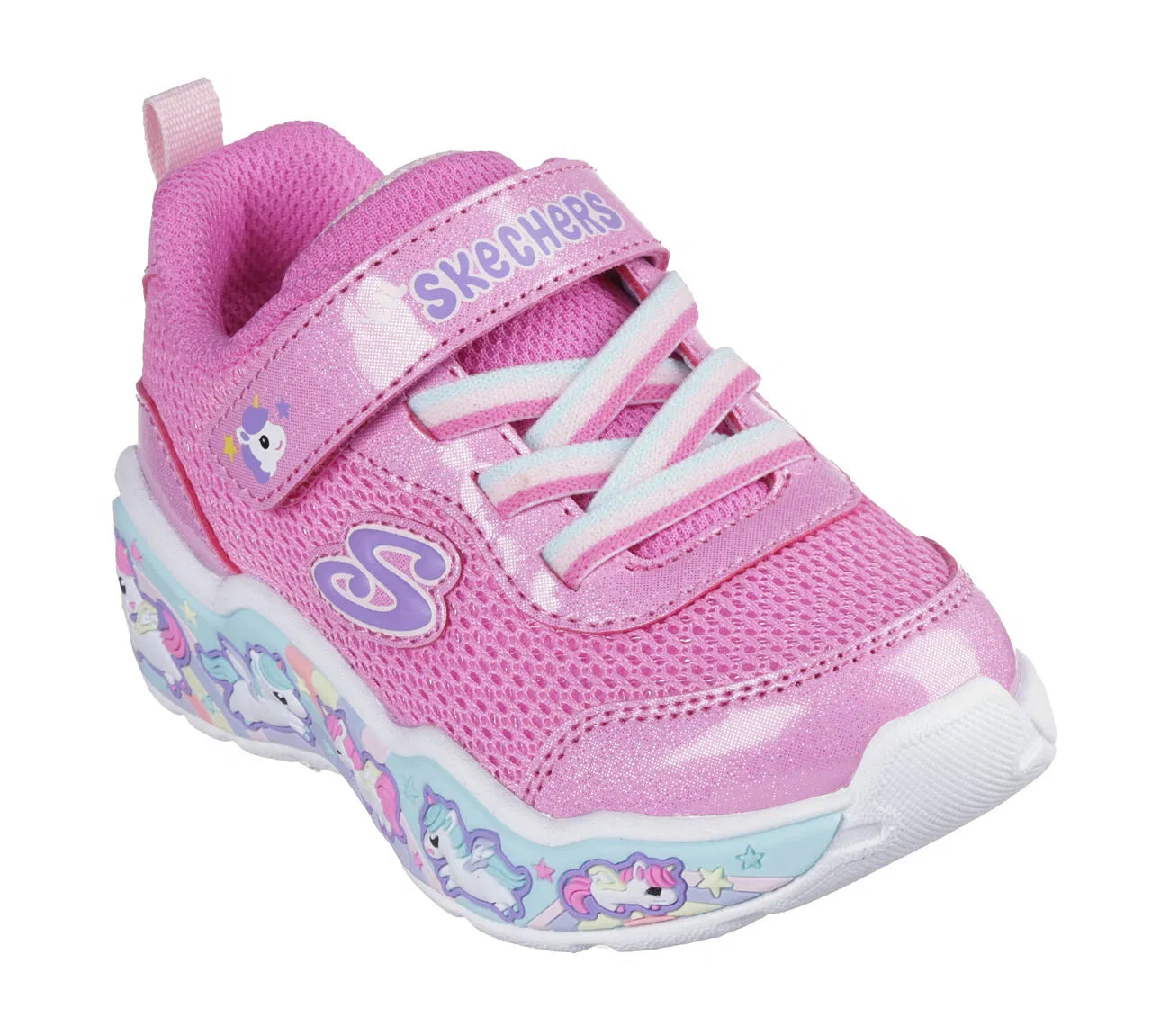 A girls trainer by Skechers, style Play Scene Fun Squad 303158N in pink ,set on multi coloured sole with unicorn motifs. Velcro fastening. Angled view.