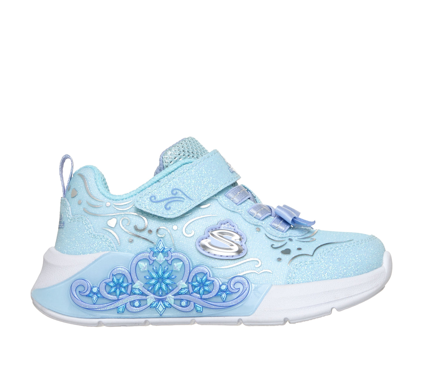 Skechers Lil Princess steps trainer in light blue with decoration on the side, a Velcro strap and white sole. Right side view. 
