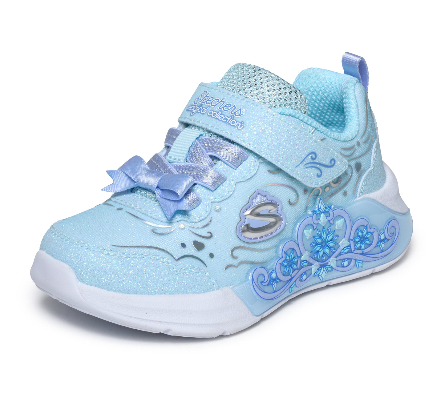 Skechers Lil Princess steps trainer in light blue with decoration on the side, a Velcro strap and white sole. Front left view