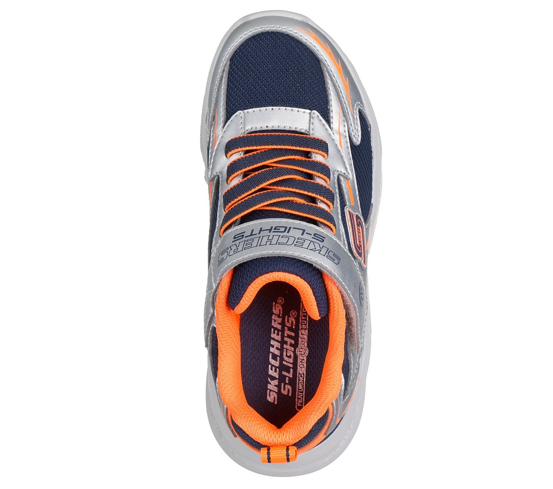 A boys casual trainer by Skechers, style Meteor Lights Glow Strider 401497L, in silver, navy and orange with light up sole and velcro fastening. Above view.