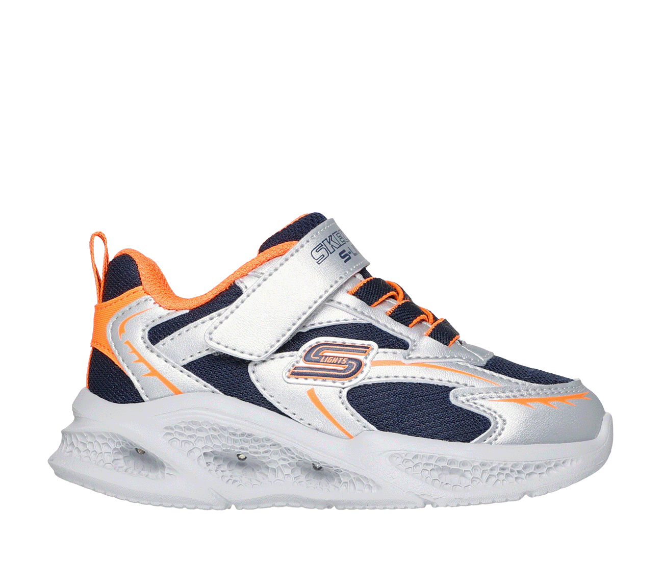 A boys casual trainer by Skechers, style Meteor Lights Glow Strider 401497L, in silver, navy and orange with light up sole and velcro fastening. Right side view.