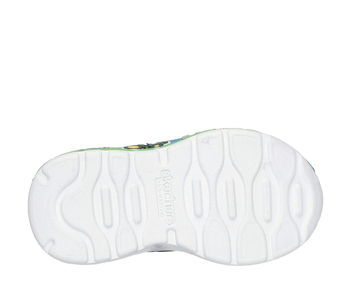 A girls trainer by Skechers, style Play Scene Barn Squad, in green and black set on blue sole with farm yard  motifs. Velcro and elastic lace fastening. Sole view.