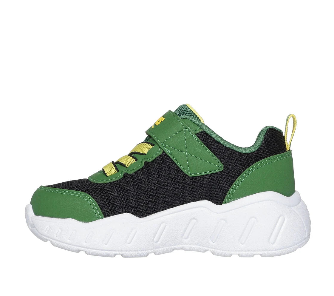 A girls trainer by Skechers, style Play Scene Barn Squad, in green and black set on blue sole with farm yard  motifs. Velcro and elastic lace fastening. Left side view.