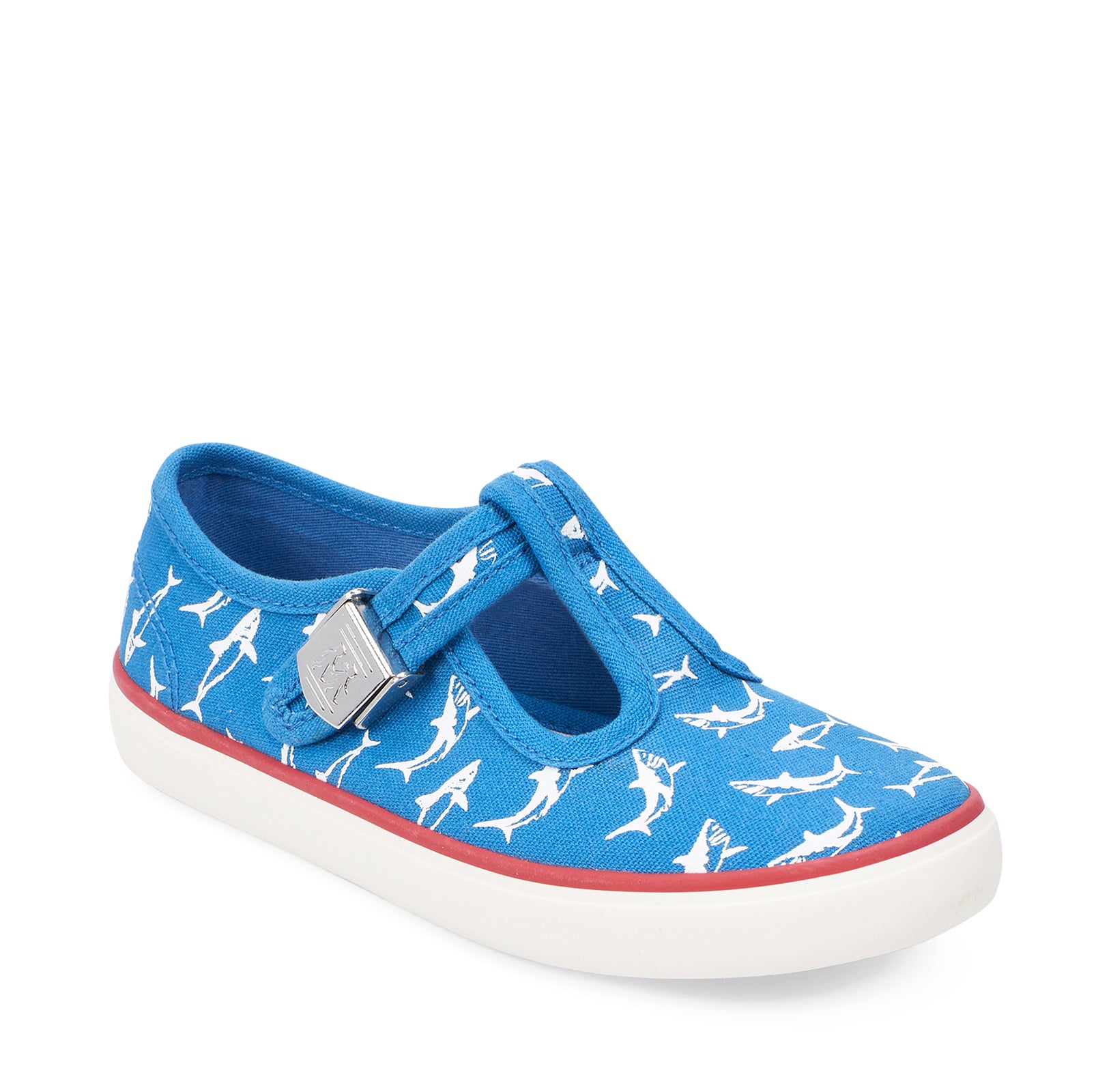 A boys canvas T-Bar shoe by Start Rite, style Surf, in blue with white shark print and buckle fastening. Angled view.
