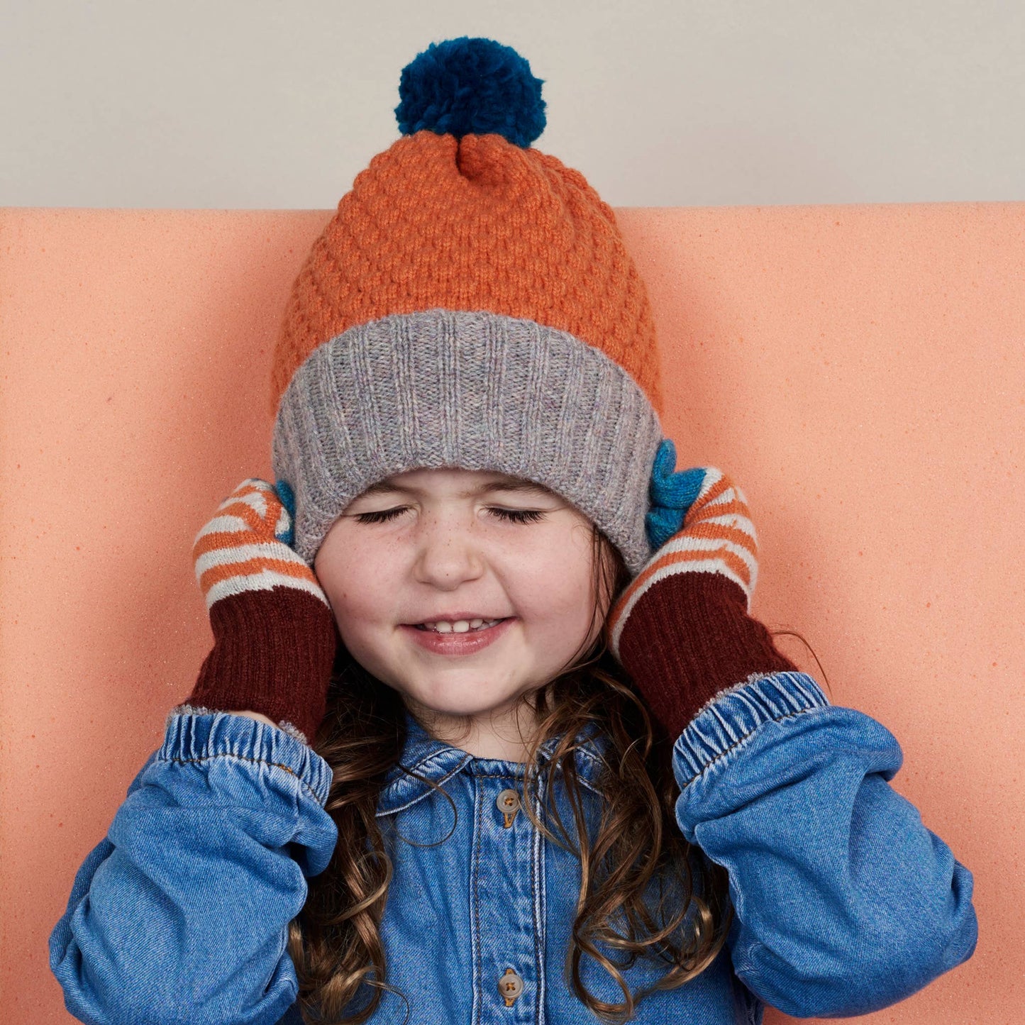 Image of child modelling hat