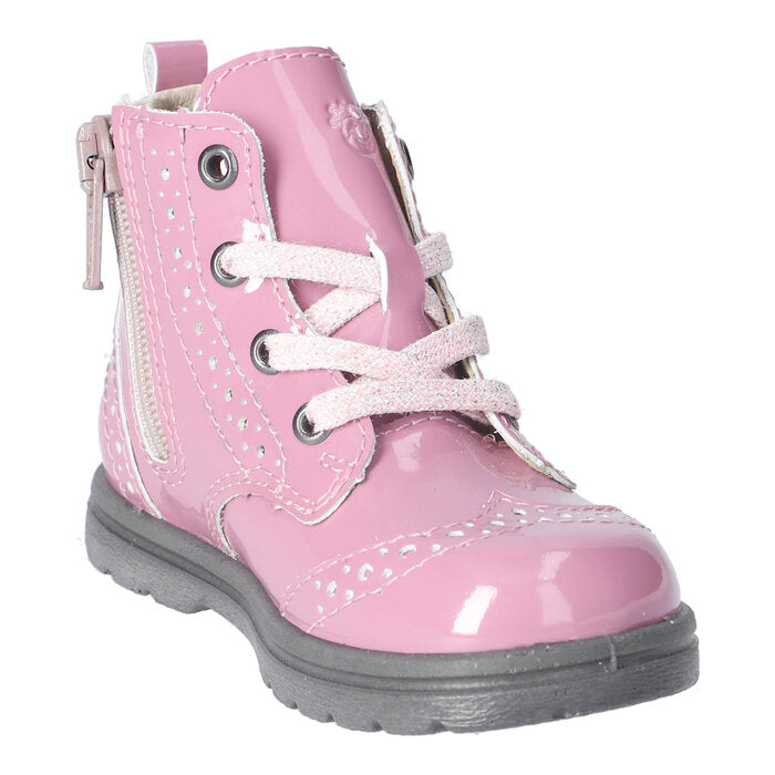 A girls lace up boot by Ricosta, style Jemmy, in pink patent with brogue detailing and zip / lace fastening. Angled left side view.
