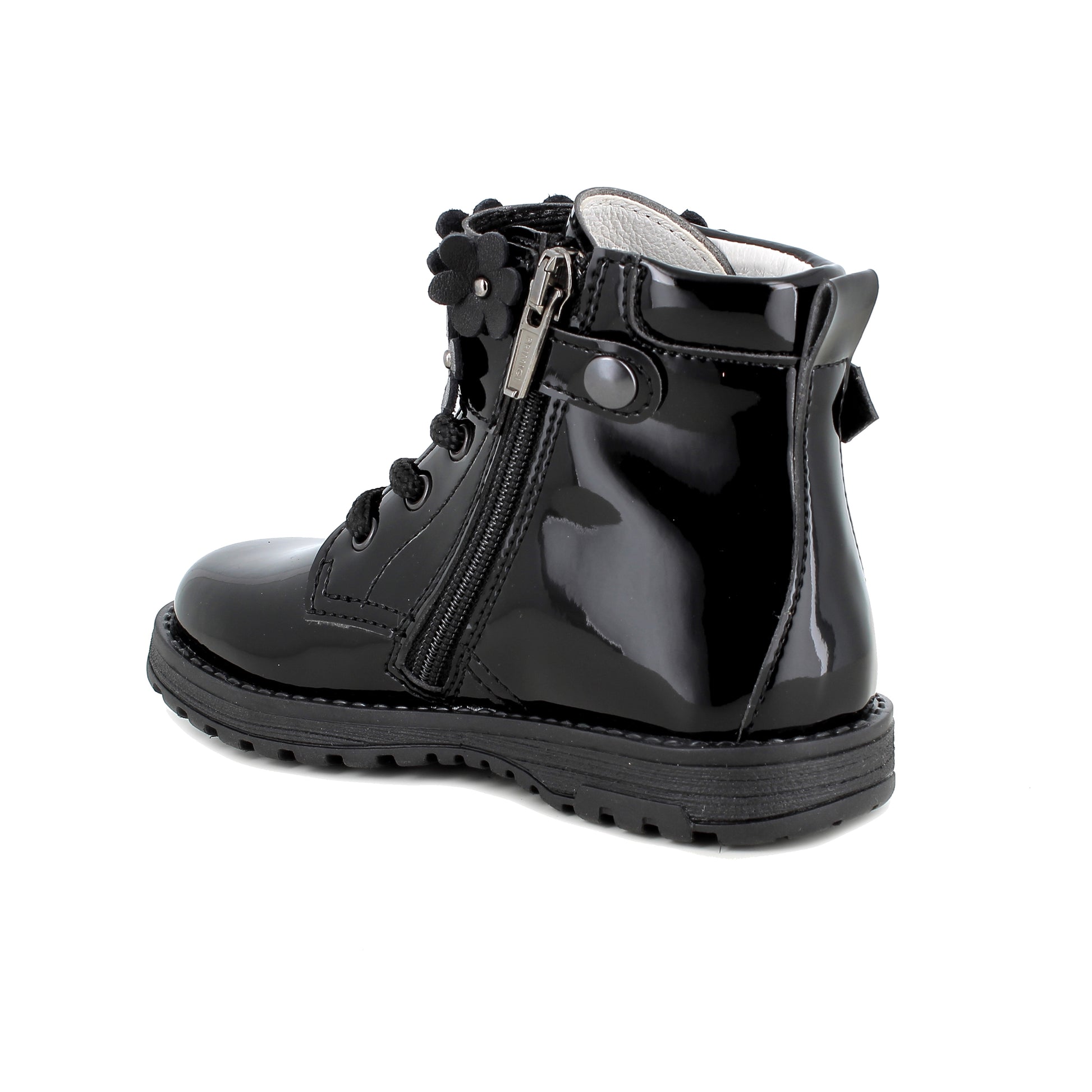 A black patent  ankle boot by Primigi, style 8913611 Serena, in black patent with flower detail and lace and zip fastening. Angled left side view.
