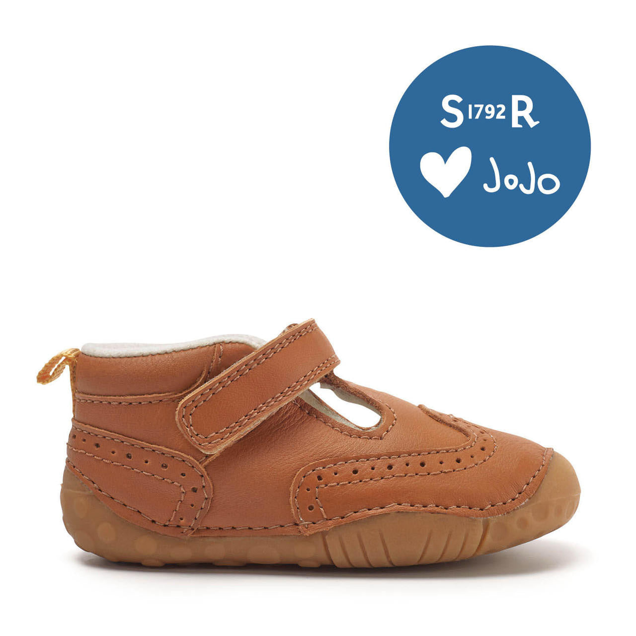 A boys T-Bar pre-walker by Start-Rite + JoJo Maman Bebe, style Share,in tan leather with brogue detail and toe bumper. Velcro fastening. Right side view.