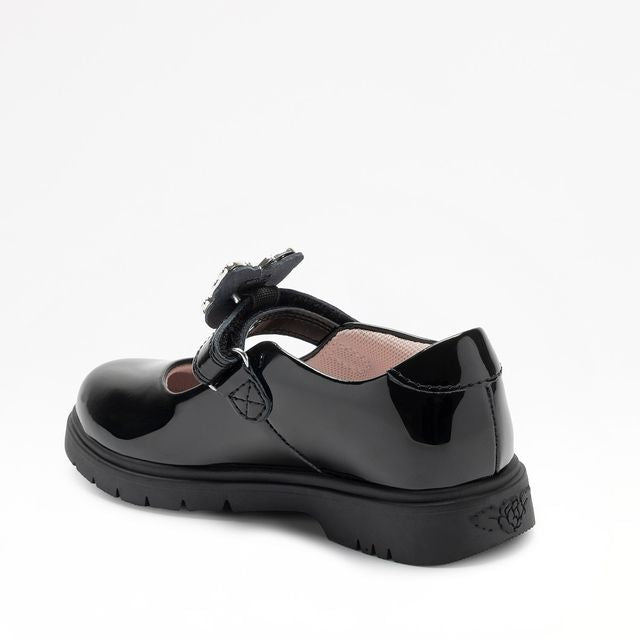 A girls Mary Jane school shoe by Lelli Kelly, style LKSO8964CVR Selena, in black patent with detachable butterfly embellished attachment. Velcro fastening. Angled left side view.