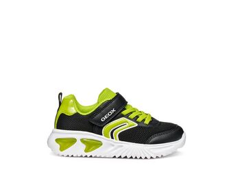 A boys trainer by Geox, style Assister, in black/lime with velcro strap and green laces. Right side view.