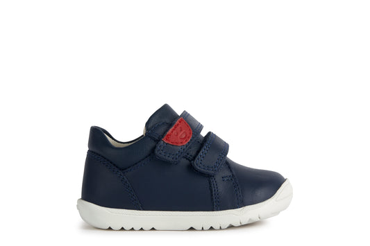 A boys shoe by Geox, style B Macchia, in navy leather with red trim and double velcro fastening. Right side view.
