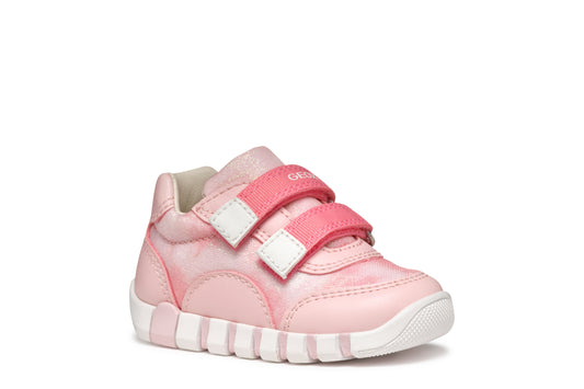 A girls shoe by Geox, style Iupidoo, in pink with double velcro fastening.  Right side view.