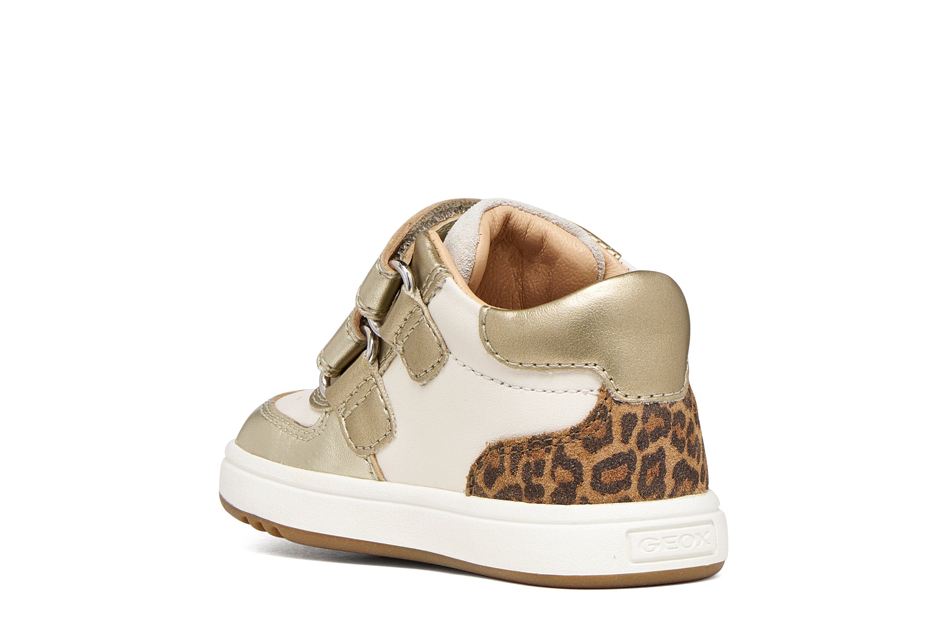 Geox girls trainer in the style Biglia in the colour ivory, with light gold details including a double Velcro strap, leopard print detailing on the heel and an ivory and gum sole. Angled back inner view of right side shoe. 