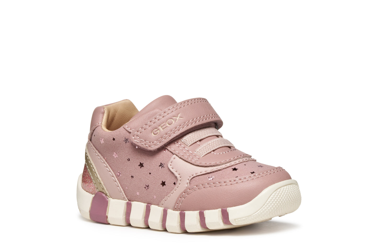 Pink Geox trainer with Velcro strap, star details and a pink and white sole. Outer right side view.